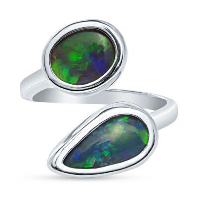a ring with an oval shaped black opal in the center