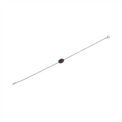 a long metal stick with a brown bead on it