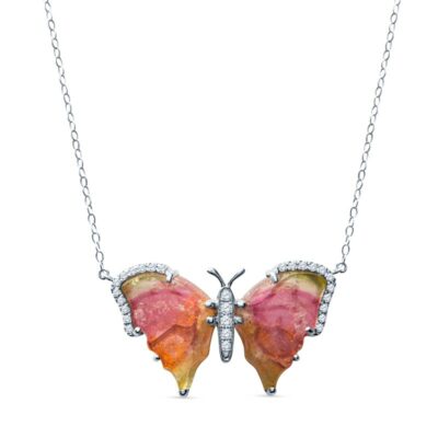 a butterfly shaped necklace with diamonds on it