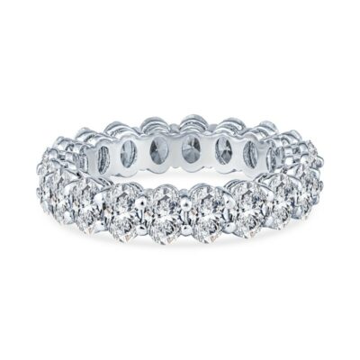 a white gold ring with rows of round diamonds