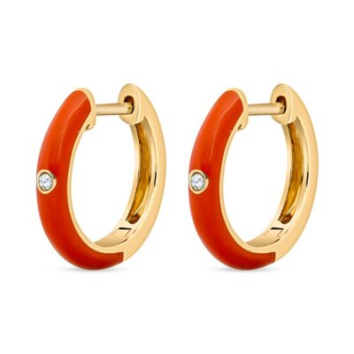 a pair of gold and red hoop earrings