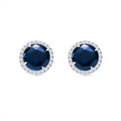 a pair of blue sapphire and diamond earrings
