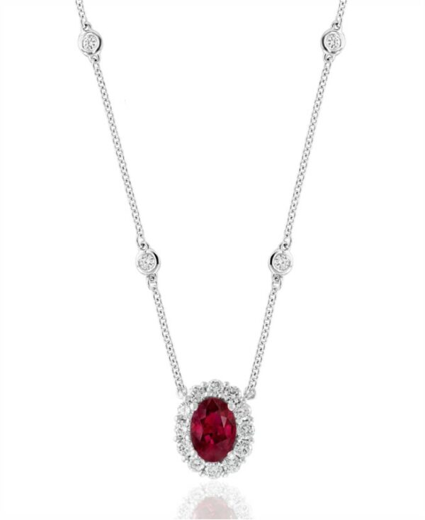 a necklace with a red stone and white diamonds