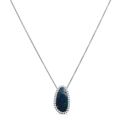 a black opal and diamond necklace on a white background