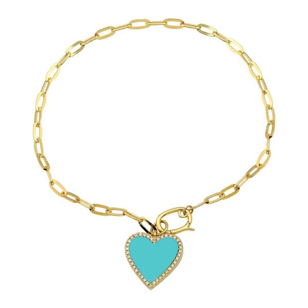 a gold bracelet with a blue heart charm