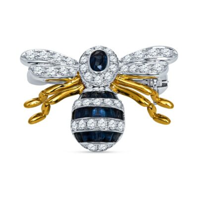 a bee brooch with diamonds and sapphires