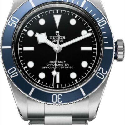 a watch with a black dial and blue bezel