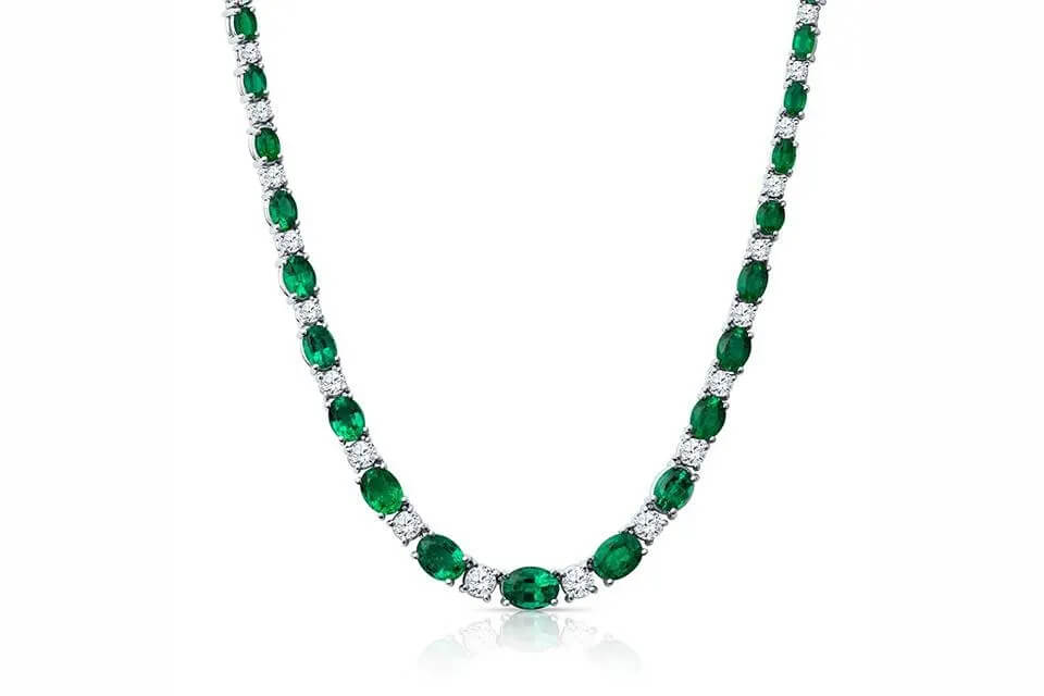 an emerald and diamond necklace