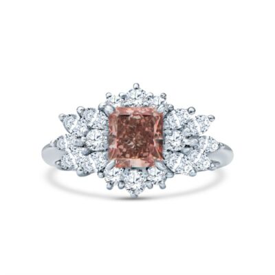 a pink diamond ring with white diamonds around it