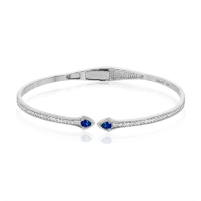 a white gold bracelet with blue sapphire stones