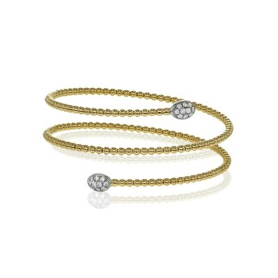 two gold and diamond bracelets