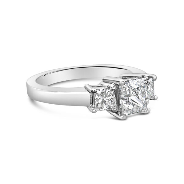 two princess cut diamond engagement rings on a white background
