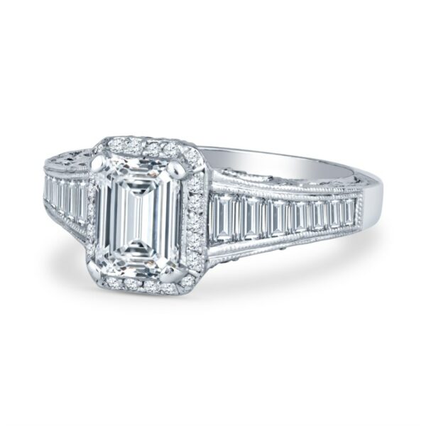 an emerald cut diamond ring with baguetts on the shoulders