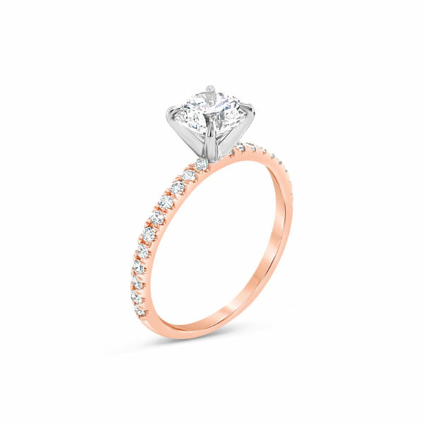 a rose gold engagement ring with a single diamond