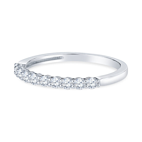 a white gold wedding band with five diamonds