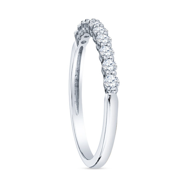 a white gold wedding ring with five diamonds