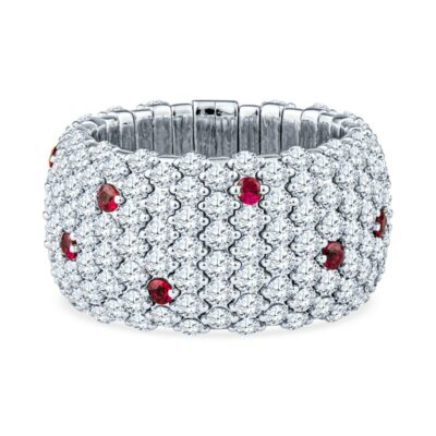 a white gold bracelet with red and white diamonds