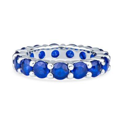 a blue ring with round cut sapphire stones