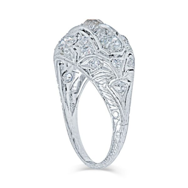 an art deco style diamond ring with filigrees