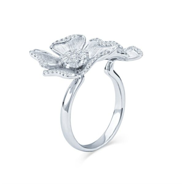 a white gold ring with flowers and diamonds