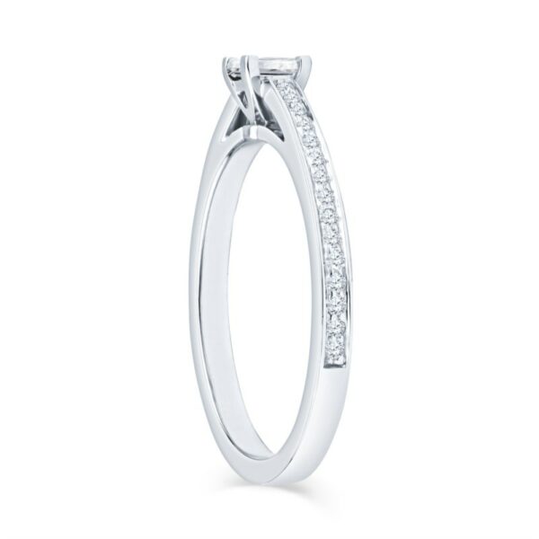 a white gold engagement ring with princess cut diamonds