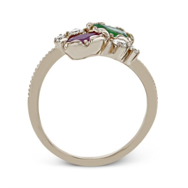 a ring with three different colored stones on it