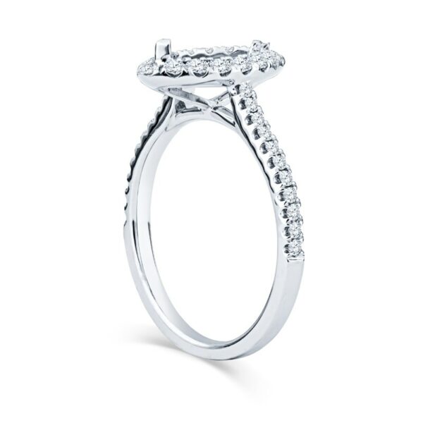 a white gold engagement ring with an oval shaped center stone
