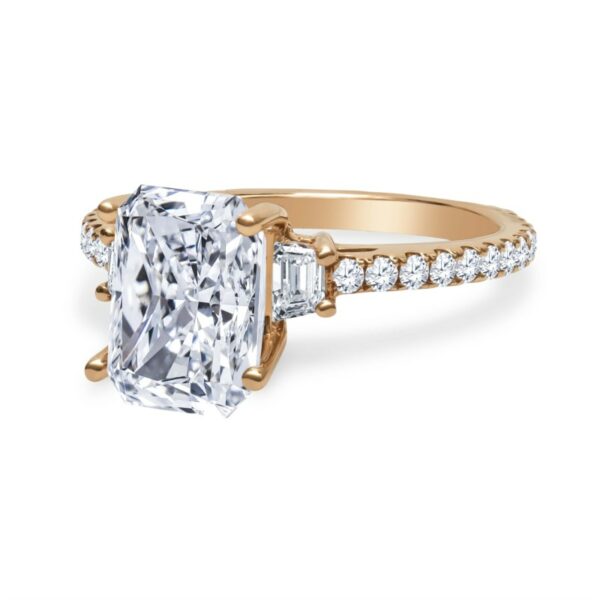 an engagement ring with a princess cut diamond and side stones