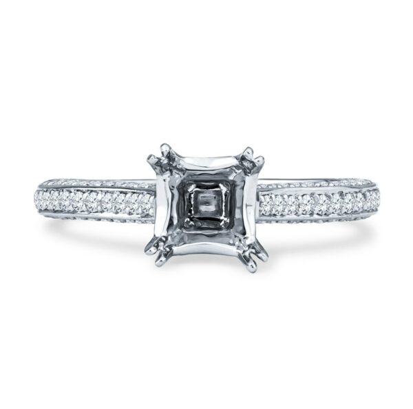 a white gold ring with a square cut diamond