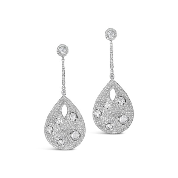 a pair of white gold earrings with diamonds
