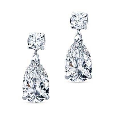 two pairs of earrings with pear shaped diamonds
