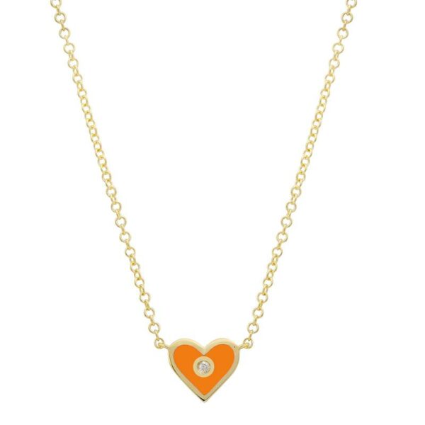 an orange heart necklace with a diamond in the middle