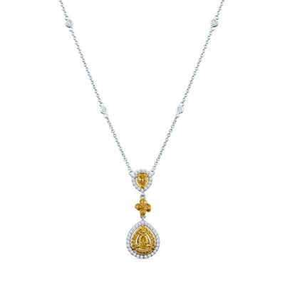 a yellow and white diamond necklace