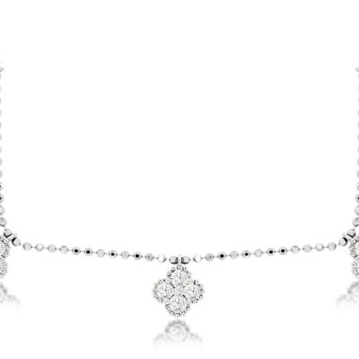 a necklace with four diamonds on it