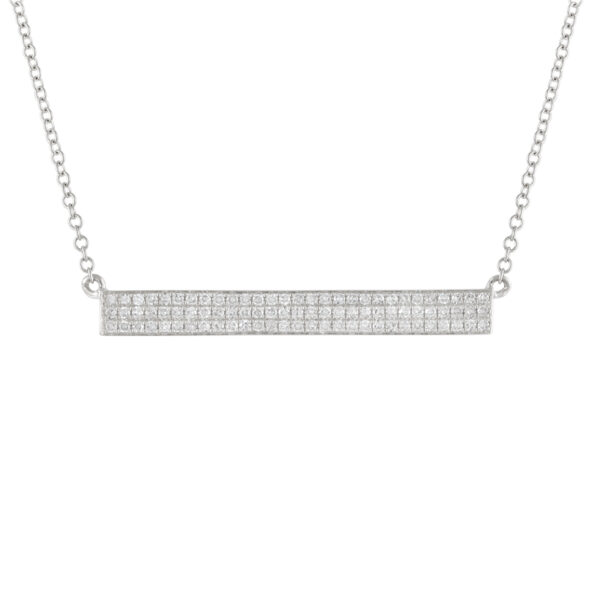 a silver necklace with white diamonds on it