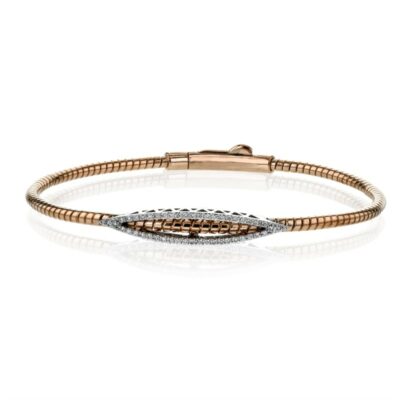 a bracelet with two tone gold and diamonds