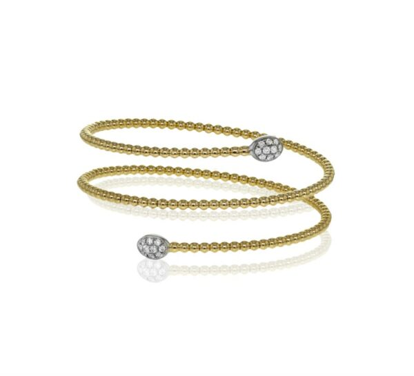 two gold and diamond bracelets