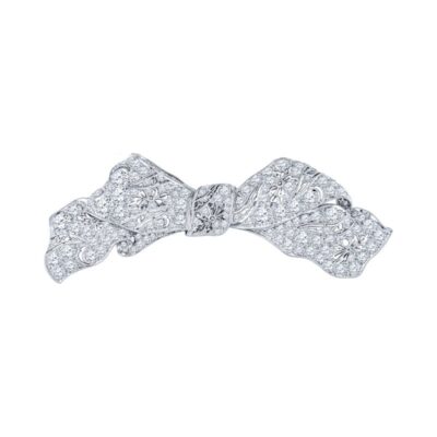 a white gold and diamond bow brooch