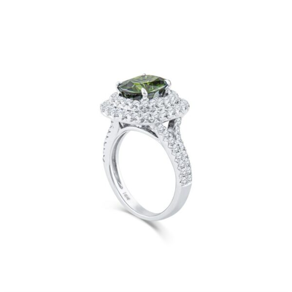 a ring with a green and white diamond