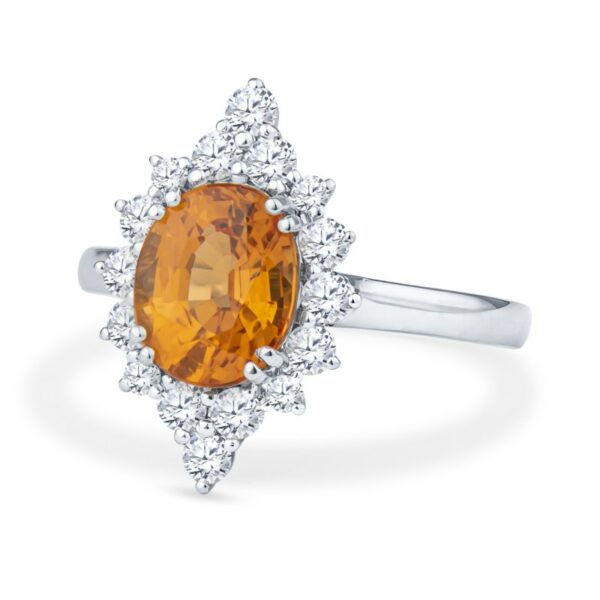 an orange sapphire and diamond ring