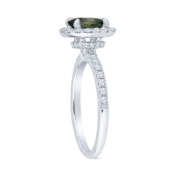 a white gold ring with a green stone and diamonds