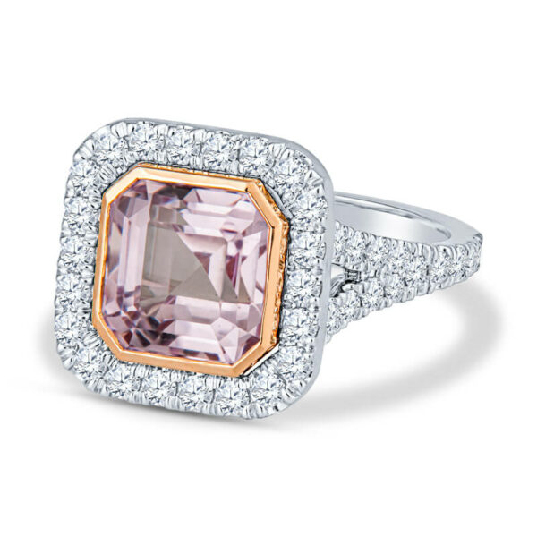 a ring with an amethorate surrounded by diamonds