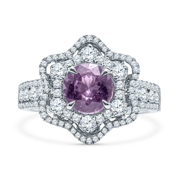a pink diamond ring with white diamonds surrounding it