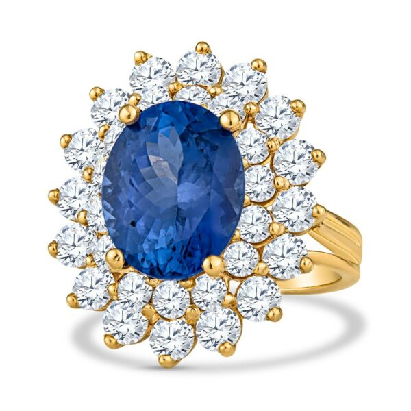 an oval blue sapphire surrounded by white and yellow diamonds