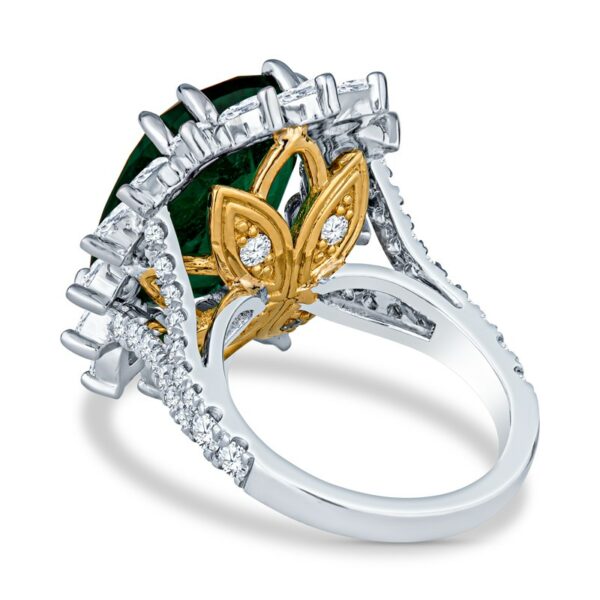 a green and yellow ring with diamonds on it