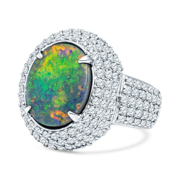 an opal and diamond ring in white gold