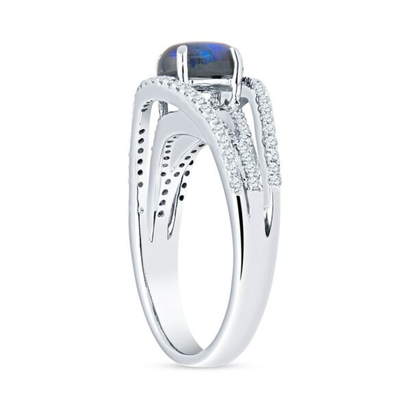 a white gold ring with a blue opal and diamonds