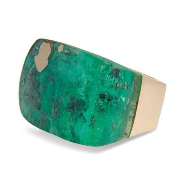 a large green stone ring on a white background