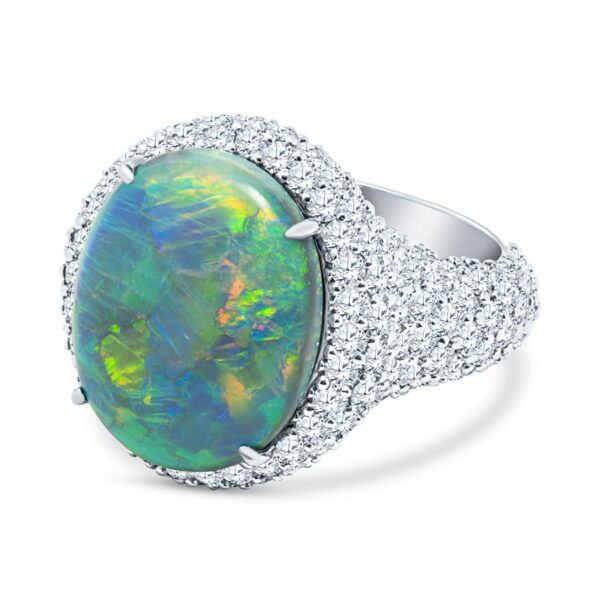 an opal and diamond ring in white gold