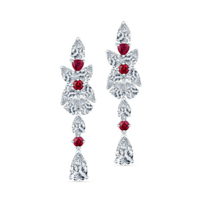 two pairs of earrings with red and white stones